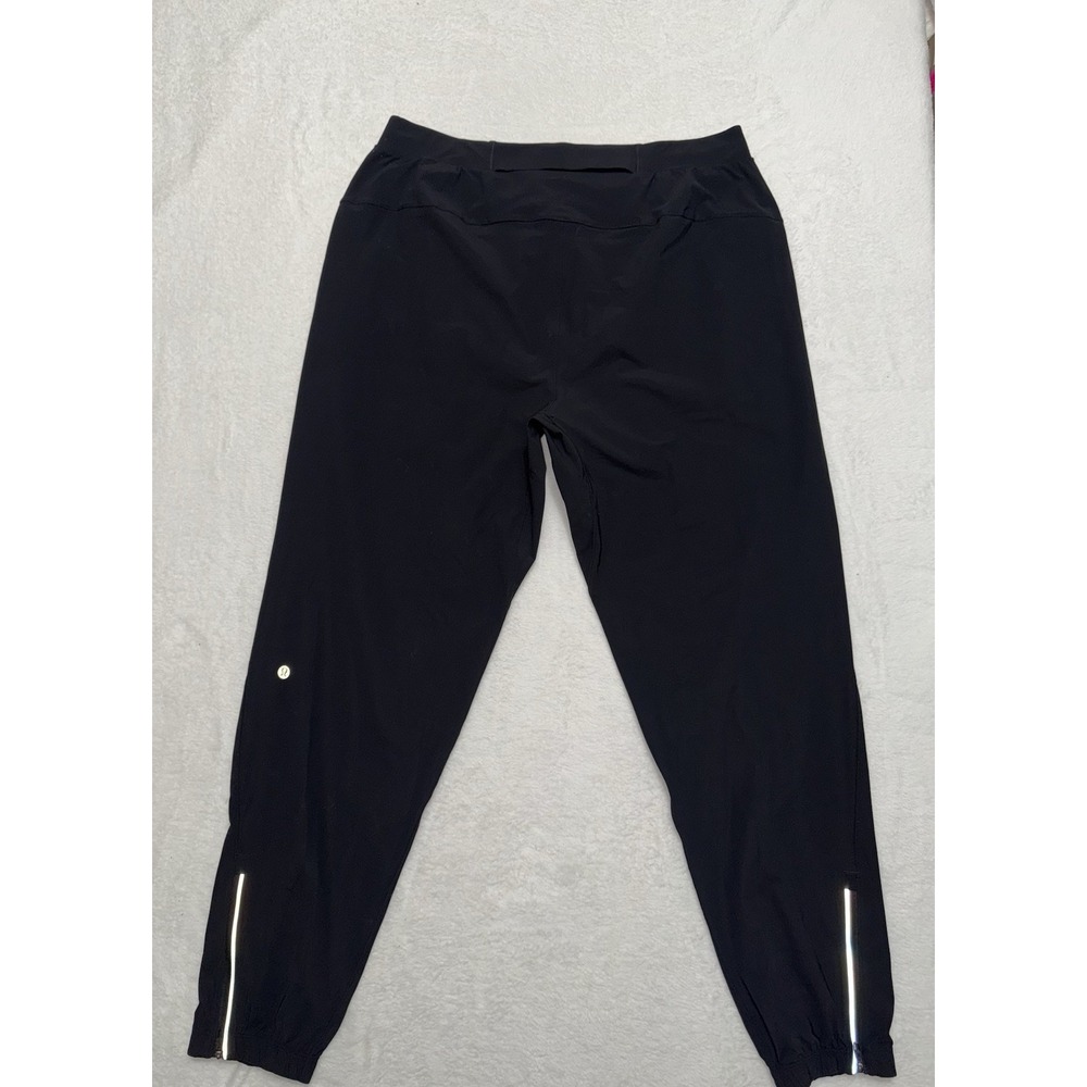 Lululemon Men's Surge Black Jogger Four Way Stretch Fabric Ankle Zipper Size XL